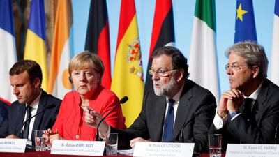 From L-R: French president Emmanuel Macron, German chancellor Angela Merkel, Spain's prime minister Mariano Rajoy and Italian prime minister Paolo Gentiloni attend a news conference following talks on EU integration, defence and migration at the Elysee Palace in Paris, France on August 28, 2017. Charles Platiau / Reuters