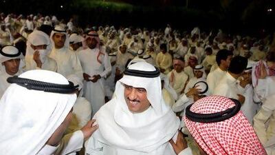 Kuwaiti opposition leader and former MP Mussallam Al Barrak (centre) attends a demonstration in Kuwait City on April 17 against a court verdict to jail him for five years for insulting the emir.