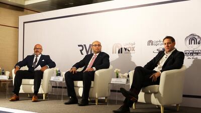 From left: Shane Eldstrom, the chief executive of Al Farwaniya Property Developments; Ahmed Galal Ismail, the chief executive of Majid Al Futtaim Ventures; and Damien Latham, the chief executive for Majid Al Futtaim Leisure and Entertainment. Pawan Singh / The National