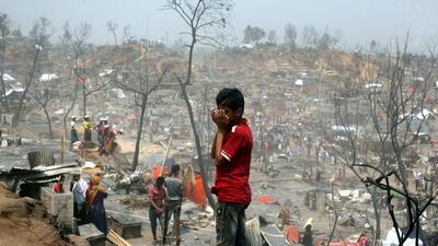 Residents of the Rohingya refugee camp in the aftermath of a huge fire in Cox's Bazar, Bangladesh. EPA