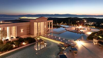 The bar and fire pit at the Amanzoe resort