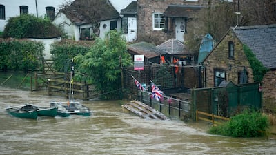 Floodwaters from the River Severn begin to encroach on riverside properties in Ironbridge, England. Getty Images