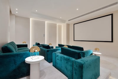 The property's plush home cinema. Courtesy Luxhabitat Sotheby's International Realty
