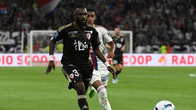 Ajaccio's Ivorian defender Ismael Diallo and Lyon's Brazilian forward Tete fight for the ball. AFP