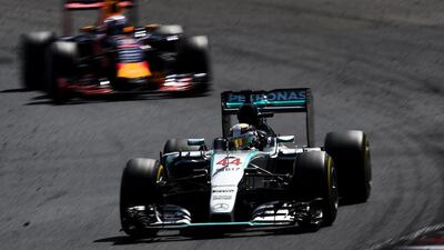 Lewis Hamilton of Mercedes-GP drives ahead of Daniel Ricciardo of Red Bull Racing during the Hungarian Grand Prix at Hungaroring on July 26, 2015 in Budapest, Hungary. (Photo by Lars Baron/Getty Images)