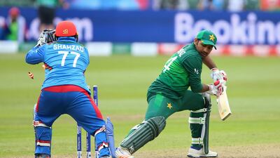 Pakistan captain Sarfaraz Ahmed, right, confident his team are capable of intimidating their opponents. Nigel French / AP Photo