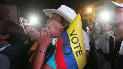 'No' supporters gather at a rally following their victory in the referendum on a peace accord to end the 52-year-old guerrilla war between the Farc and the state on October 2, 2016 in Bogota, Colombia. Colombians have voted to reject the peace deal in a shocking move. Mario Tama/Getty Images/AFP