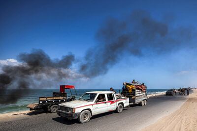 Palestinians flee Gaza city. Israel has sought to force residents to move south. AFP
