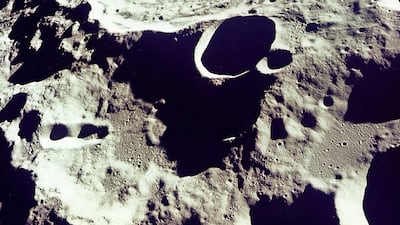 Crater 308 on the moon viewed from orbit. NASA / EPA