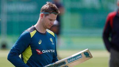 Australia's Steve Smith checks two of his cricket bats during a training session at Lord's. AP Photo