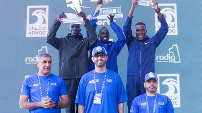 Winner of the 42km men's division with (L-R) Kiphim (2nd), Kipserem (1st) and Gonfa (3rd) with Major General Mohammed Khalfan Al Rumaithi, Commander-In-Chief of Abu Dhabi Police, Sultan Ahmed Al Jaber is Minister of State in the United Arab Emirates, the Director-General and CEO of the Abu Dhabi National Oil Company and Dr. Salem Al Kaabi, General Manager of Tadweer at the ADNOC ABU Abu Dhabi Marathon. Leslie Pableo for The National