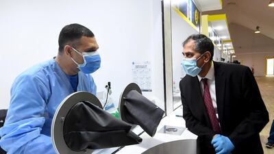 Pavan Kapoor, India's ambassador to the UAE, at a Seha health care facility in Abu Dhabi last year to screen people for Covid-19 in the Mussaffah area. Victor Besa