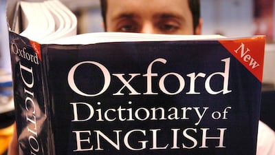 A man reading a copy of the Oxford Dictionary of English. The Oxford Dictionaries name 'post-truth' the word of the year in 2016. PA Wire/PA Images