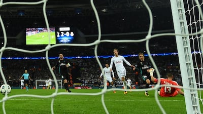 Christian Eriksen scores Tottenham's third goal. Dylan Martinez / Reuters