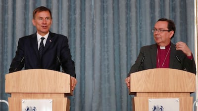 Britain's Foreign Secretary Jeremy Hunt speaks at a press conference with the Bishop of Truro Philip Mounstephen about the Bishop's final report into the Foreign Office's support for Persecuted Christians around the world. WPA Pool/Getty Images
