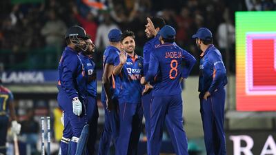 Leg spinner Ravi Bishnoi, centre, celebrates the dismissal of Sri Lanka's Janith Liyanage. AFP