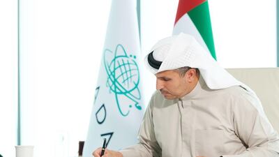 Khaldoon Al Mubarak, group chief executive of Mubadala Investment Company, signs the UAE-UK Sovereign Investment Partnership. The agreement 'provides a platform to allocate stable capital to priority sectors', Mr Al Mubarak said. Mubadala