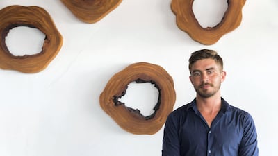 Ryan Fourie, who now works at the Azure Beach Club in JBR, Dubai, says he and his siblings were left with nothing when their parents died. Christopher Pike / The National