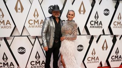 Singer Jason Aldean with wife Brittany Kerr. AP Photo