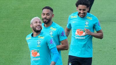 Brazil's Neymar, left, smiles during a training session at Goyang Stadium in Goyang, South Korea, Sunday, May 29, 2022. Brazil national soccer team will play a friendly soccer match against South Korea on June 2. (AP Photo / Ahn Young-joon)