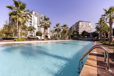 One of the three swimming pools at Dubai Production City. Chris Whiteoak / The National