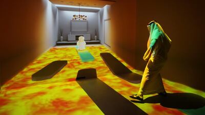 An Emirati man plays at the “Caring Machines” section of the Museum of the future during the opening day of the World Government Summit in Dubai. Kamran Jebreili / AP Photo