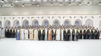 UAE Rulers, leaders, Sheikhs and other dignitaries pose for a group photo with the grooms. Mohamed Al Hammadi / Crown Prince Court - Abu Dhabi