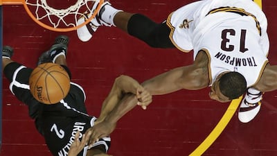 Cleveland Cavaliers’ Tristan Thompson (No 13) stops a drive by Brooklyn Nets’ Jarrett Jack (No 2) during an NBA basketball game on November 28, 2015, in Cleveland. The Cavaliers won 90-88. Tony Dejak / Associated Press