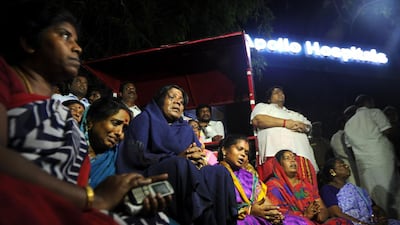 Supporters of Tamil Nadu chief minister Jayalalithas Jayaram keep vigil outside the hospital in Chennai where she is being treated on December 4, 2016. Arun Sankar / AFP