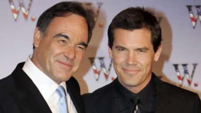 The director of 'W.', Oliver Stone and the actor Josh Brolin, right, arrive for a screening of the film in Paris last month.