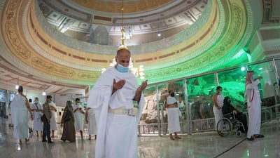 Saudis and foreign residents perform the Umrah in the Grand Mosque complex in the holy city of Makkah, as authorities partially resume the year-round pilgrimage amid extensive health precautions after a seven-month coronavirus hiatus. Saudi Ministry of Hajj and Umra / AFP