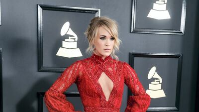2017: Carrie Underwood wears Elie Madi for the 59th annual Grammy Awards. EPA