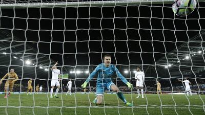Swansea City's Lukasz Fabianski looks dejected after Tottenham's Dele Alli scored their first goal. Tottenham won 3-1. Andrew Couldridge / Reuters