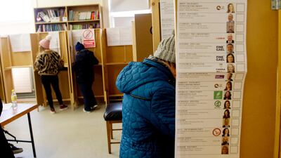 Irish people vote in general elections at a polling station in Dublin, Ireland. EPA