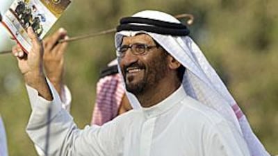 The trainer Al Raiher had a jig in the paddock waving his race card high all along.