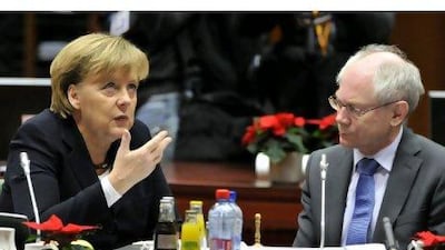 German chancellor Angela Merkel, seen talking with the European Council president, Herman Van Rompuy, at the EU summit in Brussels. European leaders signalled a willingness to grant troubled nations a fresh financial lifeline, ring-fencing the euro in a bid to fend off market vultures once and for all.