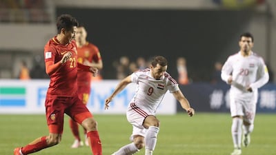 Mahmoud Al Mawas of Syria and Yu Hai of China in action. Stringer / Reuters