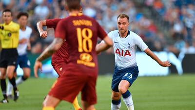 Tottenham's Christian Eriksen looks to pass under pressure. AFP