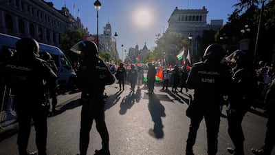 Police cordon off an area during the last stage of the Vuelta. AP