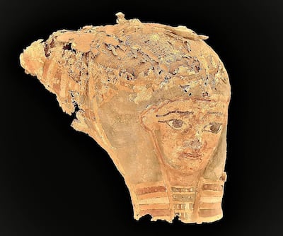A funerary mask unearthed at an archaeological site in Aswan that comprised 33 tombs dating back to various periods of Egypt's long history. Photo: Ministry of Tourism and Antiquities