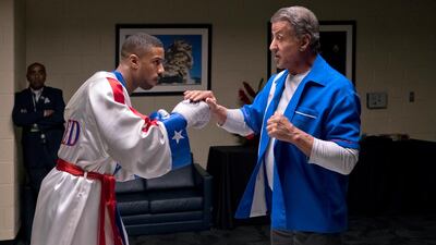 Michael B Jordan, left, and Sylvester Stallone in a scene from 'Creed II.' Barry Wetcher / Metro Goldwyn Mayer Pictures / Warner Bros Pictures via AP, File