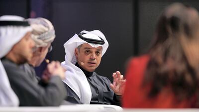 Abdulla Al Zamil (centre) says the Saudi economy went through "tough years" in 2017 and 2018 but began to pick up late last year. Chris Whiteoak / The National