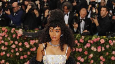 Yara Shahidi, in embellished Prada with a feather cape, arrives for the Met Gala on May 6, 2019. EPA