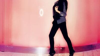 Fur wrap (part of cardigan), Dh1,950, Alice+Olivia at Harvey Nichols. Jacket, Dh8,500, Sacia at S*uce. Blouse, Dh4,385, Sonia Rykiel. Trousers, Dh7,300, Christian Dior. Ring, Dh480, Noir at S*uce.