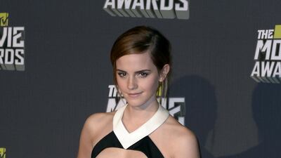 Emma Watson, in Maxime Simoens, attends the MTV Movie Awards in Culver City, California, on April 14, 2013. EPA