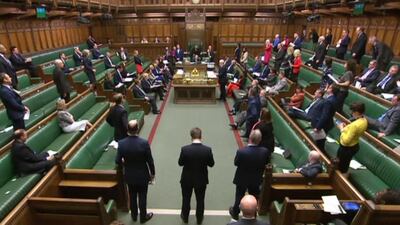 A video grab from footage broadcast by the UK Parliament shows MPs in a largely empty chamber during the weekly Prime Minister's Question time (PMQs) on March 18, 2020. AFP Photo/PRU