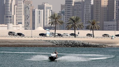 Residents jet skiing at Mamzar Beach, Dubai. Pawan Singh