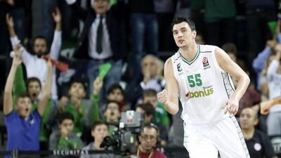 Darussafaka’s Emir Preldzic reacts after scoring against Dinamo Sassari in his team’s Euroleague victory on Thursday night. Tolga Bozoglu / EPA