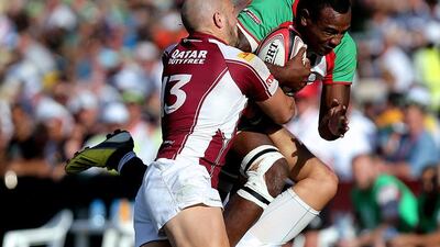 Abu Dhabi Harlequins, in red, white and green, beat Doha to reassert their position in Arabian Gulf club rugby. Satish Kumar / The National