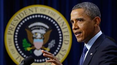 President Barack Obama gestures as he speaks about the fiscal cliff in the South Court Auditorium at the White House in Washington. AP Photo/Charles Dharapak